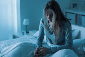 stock photo of a woman experiencing insomnia