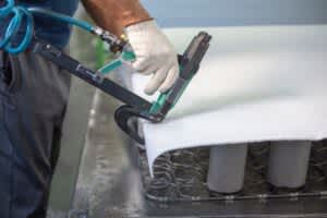stock photo of a person constructing a mattress