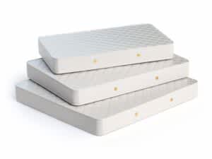 stock photo of mattresses stacked on top of each other