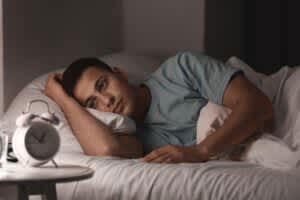 stock photo of a young man suffering from insomnia