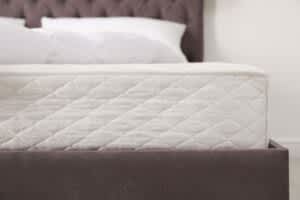 stock photo of a mattress and bedframe