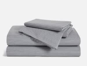 Product page photo of the Brooklinen Luxe Sateen Sheets