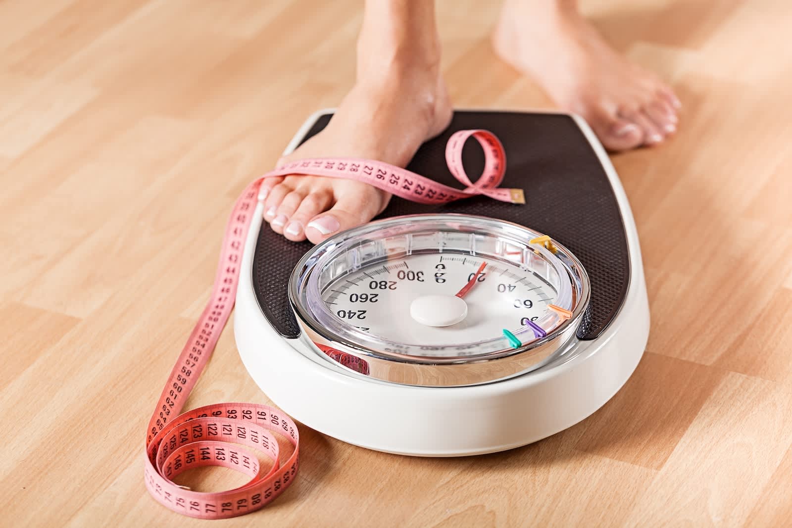 person standing on a scale