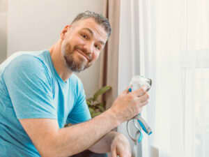 Happy healthy man with CPAP