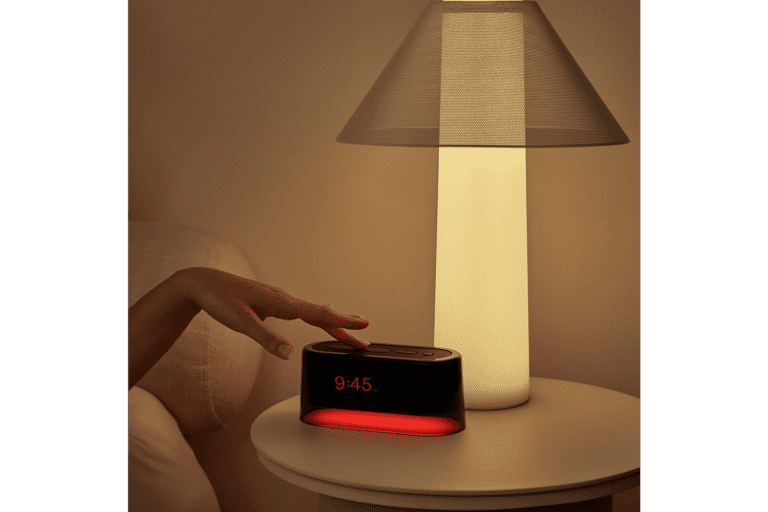 Loftie clock on nightstand with lamp
