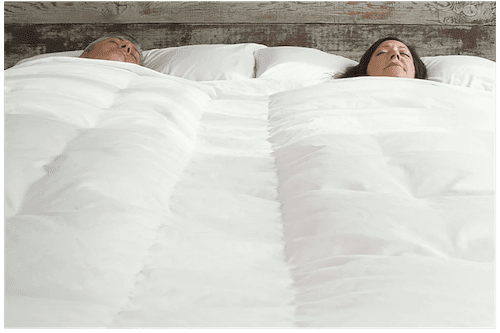 couple sleeping under BedJet Cloud Sheet