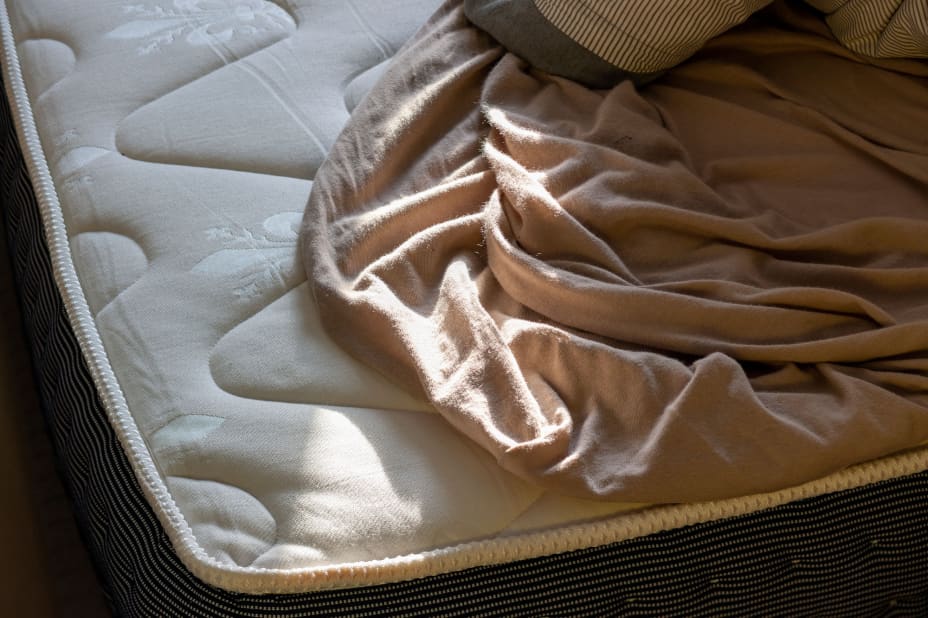 How to Keep a Mattress Topper From Sliding - eachnight