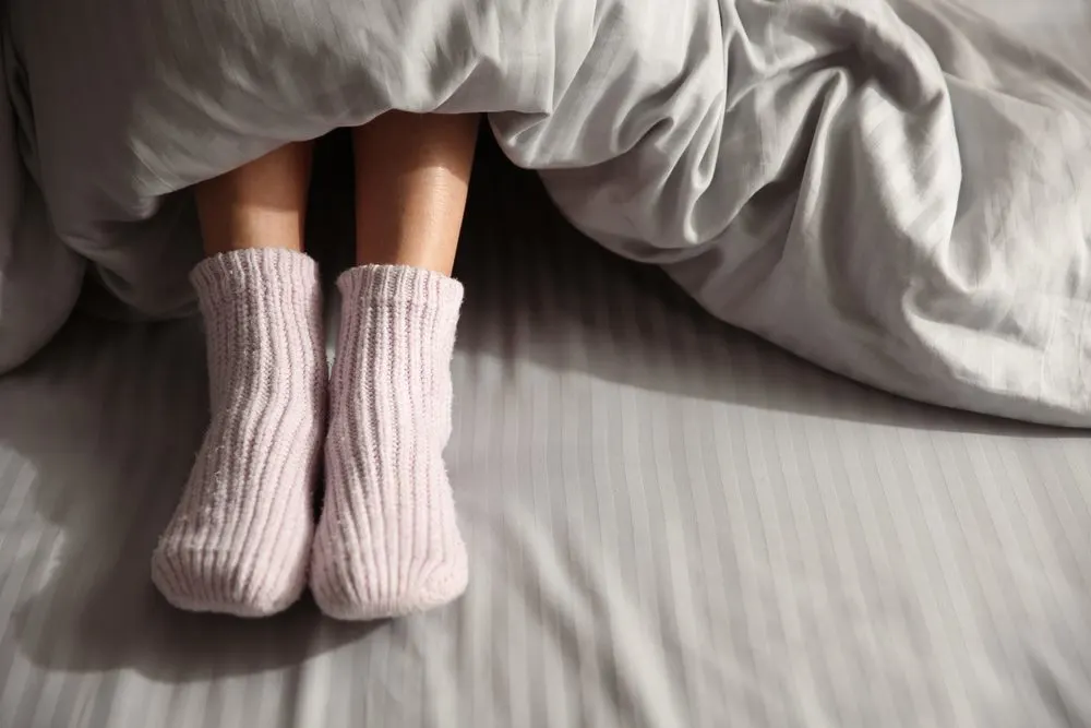 Did you know that wearing socks in bed is good for health