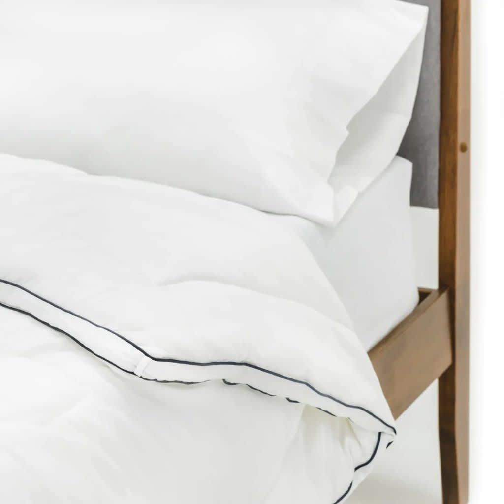 closeup image of the Comma Home Eucalyptus Comforter