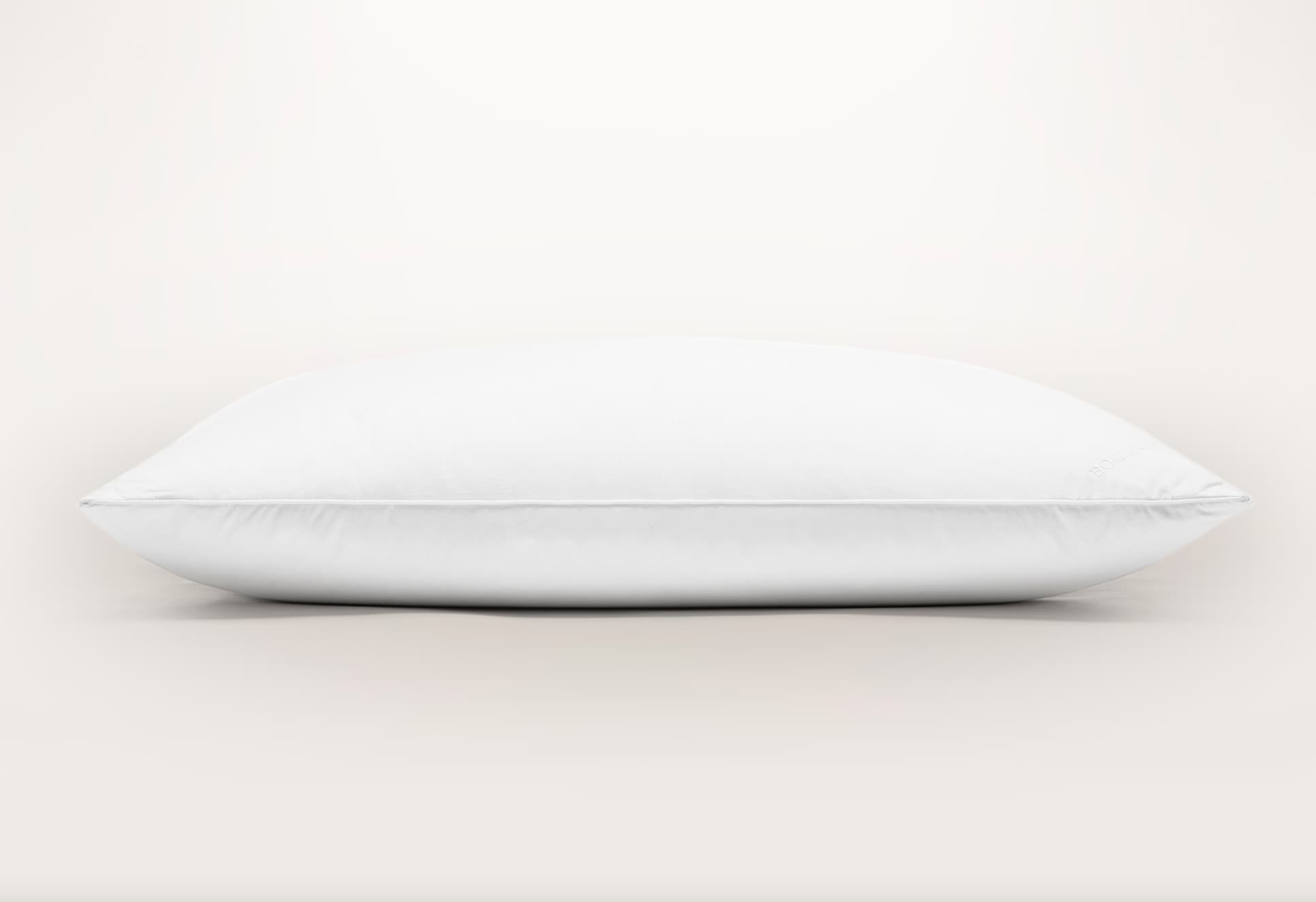https://media.sleepdoctor.com/images/f_auto,q_auto:eco/v1676678582/thesleepdoctor-com/Boll-Branch-Down-Alternative-Pillow-1/Boll-Branch-Down-Alternative-Pillow-1.png?_i=AA